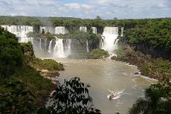 15 Tourist Boat Leaves Argentina Iguazu Falls Heading Towards Devils Throat From Brazil Narrow Trail.jpg